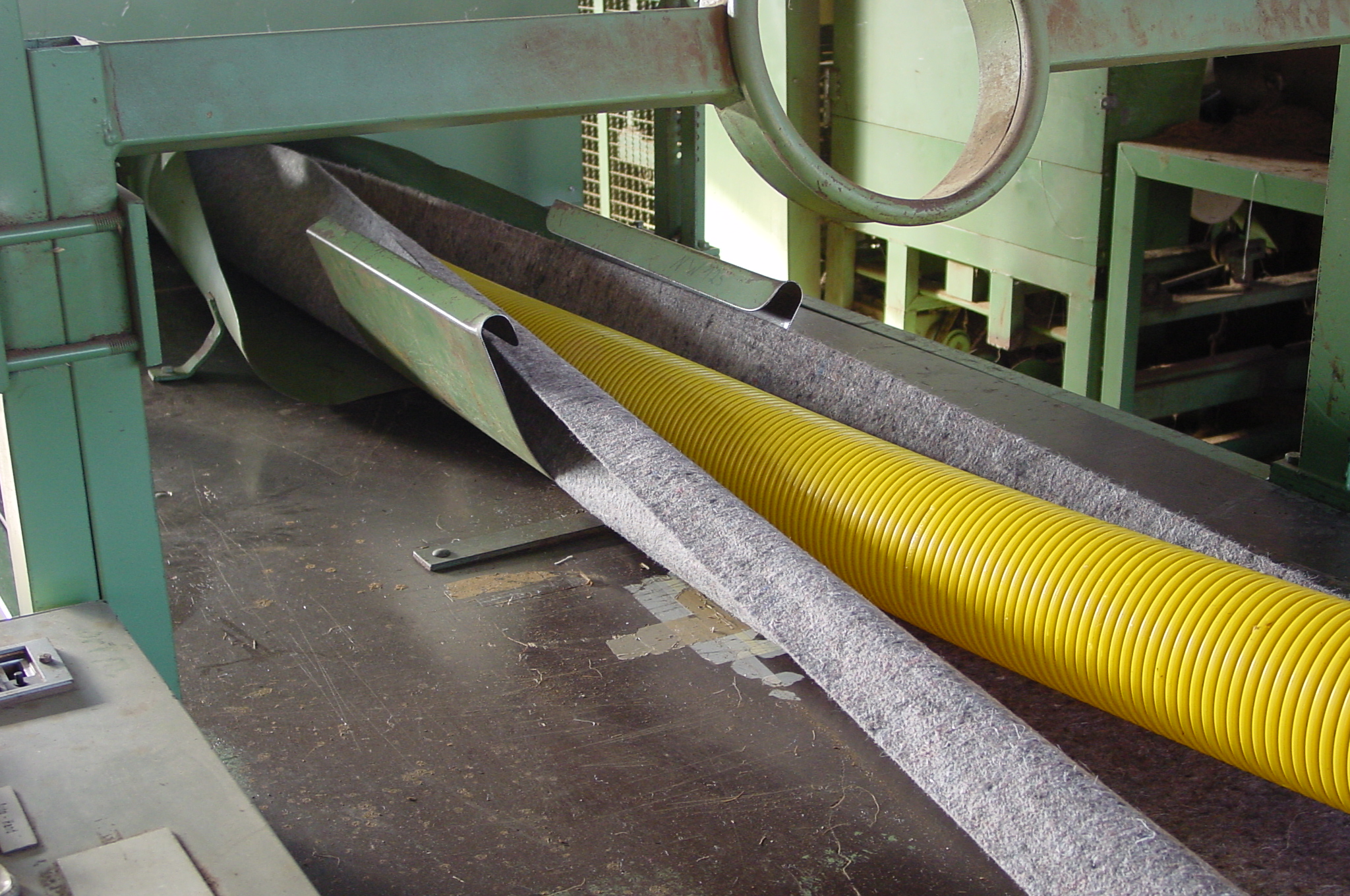 Rohrummantelungsmaschine für Drainagerohre